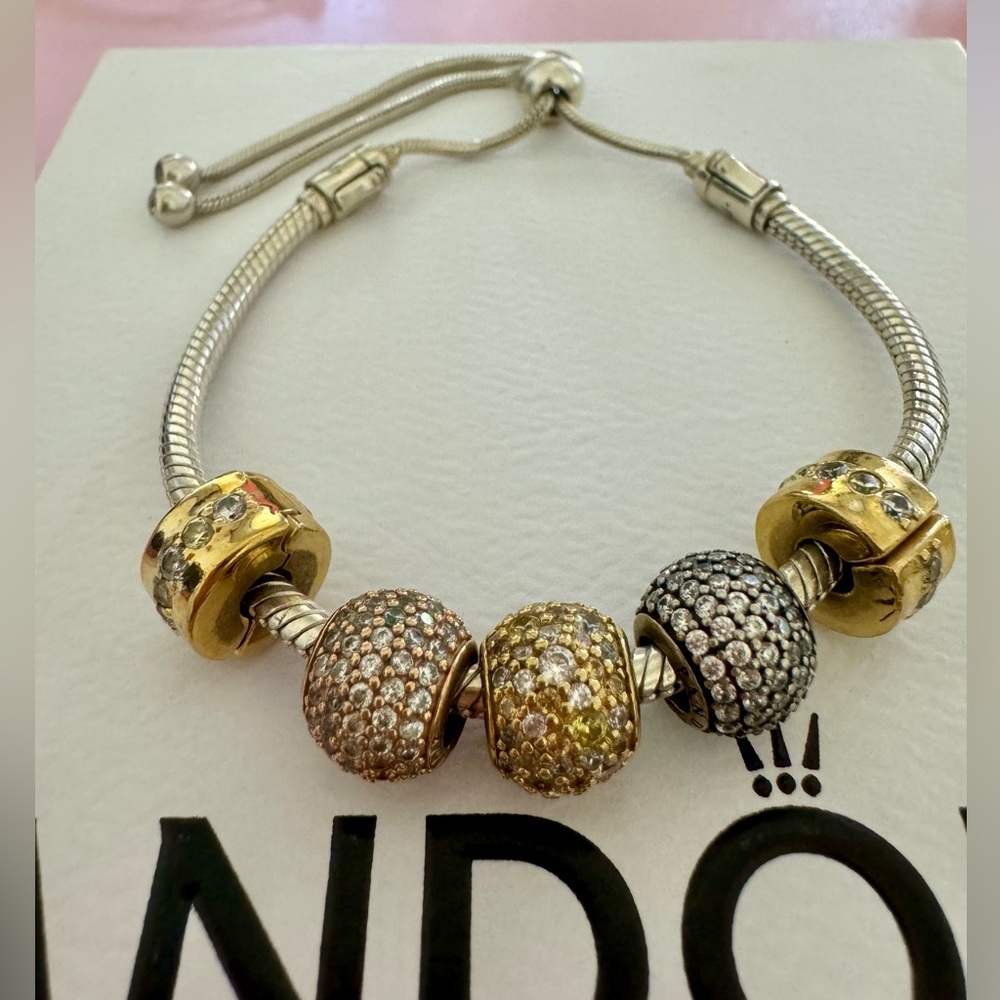 Authentic Pandora Bracelet with charms and clips